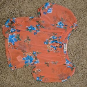 Orange floral blouse